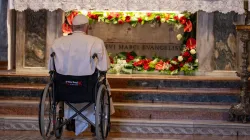 Pope Francis prays in front of the tomb of St. Mark the Evangelist inside St. Mark's Basilica in Venice on April 28, 2024. / Credit: Daniel Ibañez/CNA