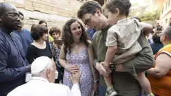 Pope Francis blesses a pregnant woman during a visit with families from St. Bridget of Sweden Parish in Rome’s Palmarola neighborhood on June 6, 2024. / Credit: Vatican Media