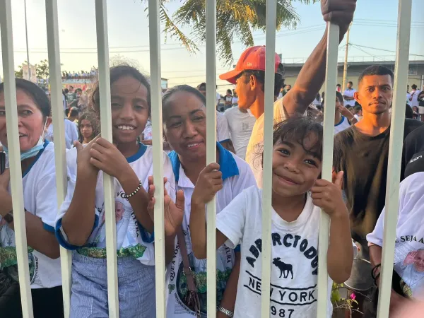 Crowds line the streets of Dili, East Timor, for miles to greet Pope Francis upon his arrival to the country on Sept. 9, 2024.