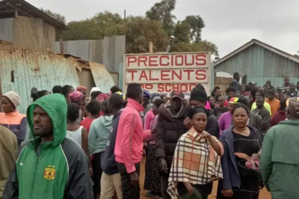 Onlookers at the collapsed two-storey school building at the Precious Talent Top School in Nairobi