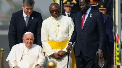 Fr. John Lo’boko Morris beside Pope Francis following his arrival in Juba on 5 February 2023. Credit: Elias Turk