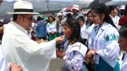 A priest gives Communion to children at the 53rd International Eucharistic Congress in Quito, Ecuador, on Sunday, Sept. 8, 2024. / Credit: Eduardo Berdejo/EWTN News