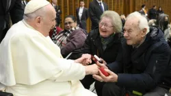 Pope Francis greets an elderly couple at his general audience on Jan. 11, 2023 | Vatican Media