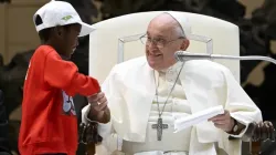 Pope Francis shakes hands with one of the approximately 7,000 children from around the world in the Vatican’s Paul VI Hall on Nov. 6, 2023, at an event sponsored by the Dicastery for Culture and Education dedicated to the theme “Let us learn from boys and girls.” | Credit: Vatican Media