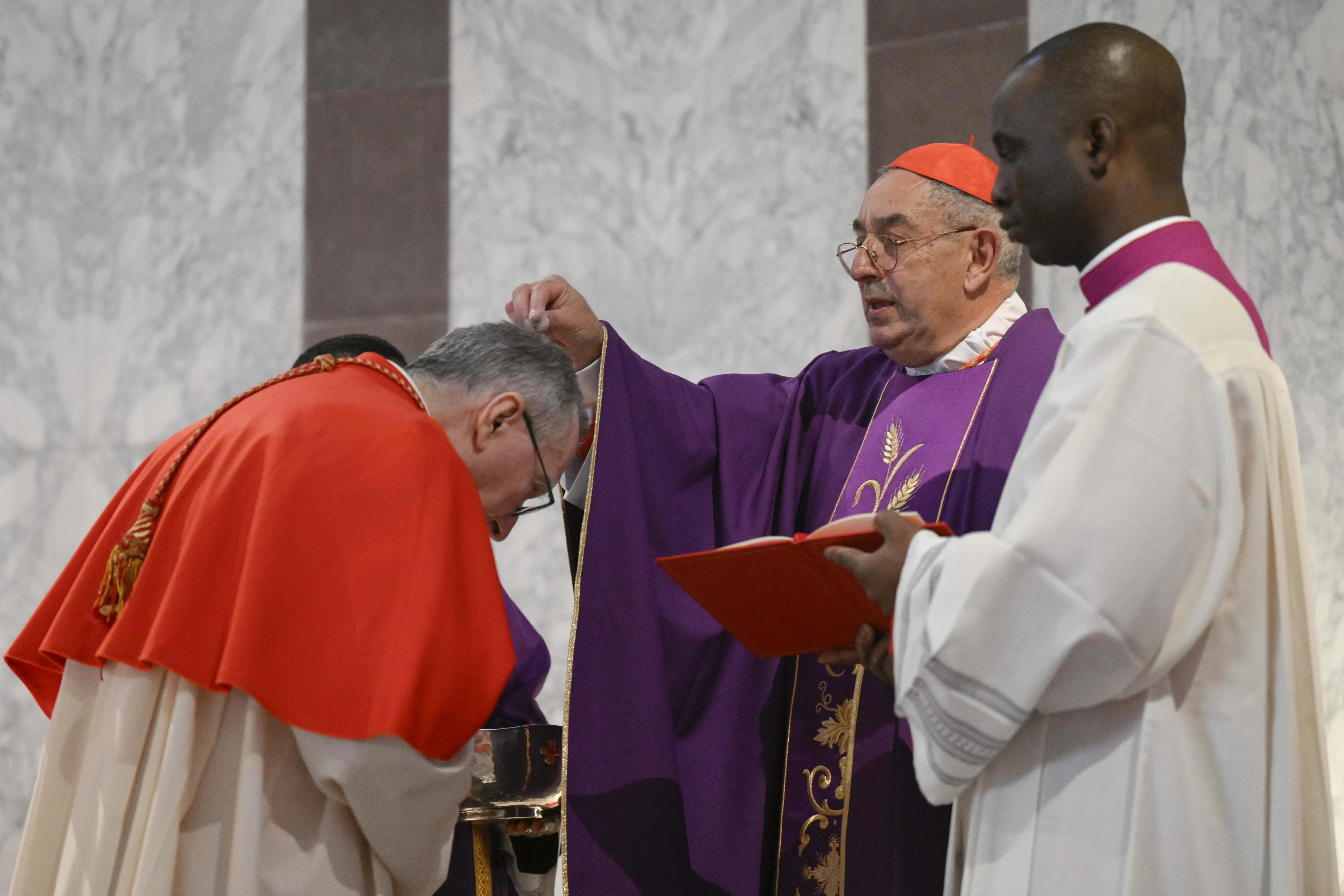 Cardinal Angelo De Donatis sprinkles ashes during the celebration of Mass on Ash Wednesday, March 5, 2025, at the Basilica of Santa Sabina located on Rome’s Aventine Hill. / Credit: Vatican Media