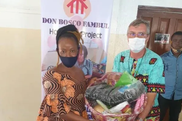 Young women receive job starter kits in Sierra Leone after graduating from training in tailoring, tourism, catering and hair care. / Salesians of Don Bosco (SDB)