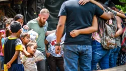 A Christian mission team is pictured praying in Guatemala in 2019. | Credit: Shutterstock