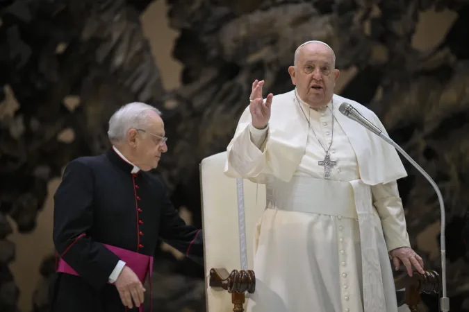 Pope Francis speaks during the annual Christmas gathering with employees in the Vatican’s Paul VI Hall on Dec. 22, 2024