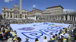 Members of ACLI (Italian Christian Workers' Associations) hold a sign with the word "peace" in Italian, in St. Peter's Square on June 1, 2024. / Credit: Vatican Media