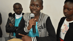 South Sudan Peace Ambassadors reciting poem to Apostolic Nuncio in Kenya and South Sudan on Sunday, October 6: From left Rebjwok Karlo, Sophie Faith Juwa (with mic) and Nyenawut Akol Miyen / ACI Africa