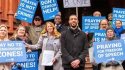 Isabel Vaughan-Spruce (center-left) and Father Sean Gough (center-right) celebrate their legal win outside the Birmingham Magistrates Court in Birmingham, England, on Feb. 16, 2023. | Credit: March for Life UK