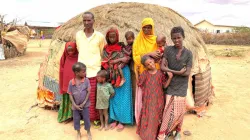 Habso’s family walked for 20 days from Wajid Region to Luuq town in Gedo Region, southern Somalia (approx. 70 kms) when the last of their goats died and they had no food to sustain the family. Left to right back row: Anab (7); Father Ibrahim Yarow (49); Habiba (8); Habso (3); mother Abshiro Adn Mohammad, (35), baby Nasra (8 months); Hassan (9). Front row: Abdi Nassir (5); Abdifatah (4) and Fartun (6) Pic: Miriam Donohoe. Credit: Trócaire