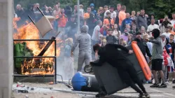 Protesters attempt to enter the Holiday Inn Express Hotel, which is housing asylum seekers, on Aug. 4, 2024, in Rotherham, United Kingdom. / Credit: Christopher Furlong/Getty Images