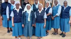 Daughters of St. Paul Superiors in Kenya, Malawi, South Sudan, Tanzania, Uganda, Zambia, and Zimbabwe, flanked by the Delegate Superior, Sr. Rosemary Mwaiwa (in white scuff). Credit: Daughters of St. Paul, Nairobi