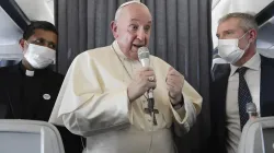 Pope Francis speaks during an in-flight press conference on the journey from Athens to Rome, Dec. 6, 2021. Vatican Media.