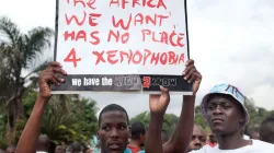 Foreign nationals in South Africa during an anti-xenophobia match outside the city hall of Durban in 2015.