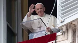 Pope Francis waves from his window overlooking St. Peter’s Square during an Angelus address. Credit: Vatican Media.