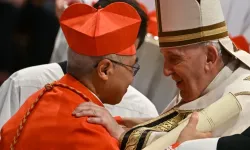 Pope Francis speaks to Archbishop William Seng Chye Goh (left) after he elevated him to cardinal during a consistory to create 20 new cardinals on Aug. 27, 2022, at St. Peter’s Basilica at the Vatican. / Credit: Alberto Pizzoli