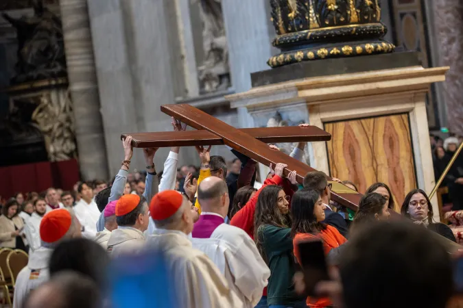 Portuguese youth carry the World Youth Day cross in St. Peter's Basilica on the solemnity of Christ the King, Nov. 24, 2024