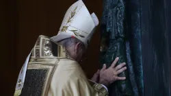 Cardinal Baldassare Reina ceremonially pushes open the Holy Door at St. John Lateran on Dec. 29, 2024. / Credit: Evandro Inetti/EWTN/Vatican Pool