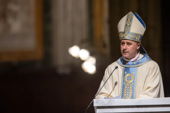 Cardinal Rolandas Makrickas, wearing Marian blue and cream vestments, delivers the homily during the Mass opening the Jubilee Year at Rome's Basilica of St. Mary Major on Jan. 1, 2025