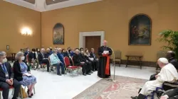 Pope Francis meets participants in the international conference ‘Lines of Development of the Global Compact on Education’ in a room adjacent to the Vatican's Paul VI Hall, June 1, 2022. Vatican Media.