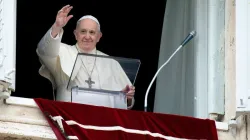 Pope Francis waves from his window overlooking St. Peter’s Square during an Angelus address. Credit: Vatican Media.