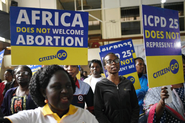 Anti-abortion, and pro-family activists hold placards during a prayer rally organized by CitizenGo in Nairobi, on November 14, 2019 / The Heritage Foundation