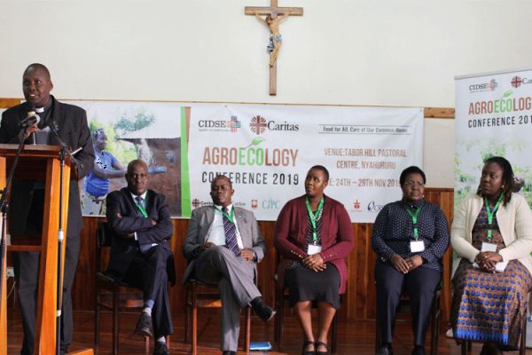 Fr. John Nene (standing - Caritas Nyahururu); From left: Stephen KItuku (Caritas Kenya), Dennis Kioko (Trocaire), Stellamaris Muelar (Fastenopfer), Margaret Mwaniki (Caritas Africa), and Hellen Owiti (Trocaire) / ACI Africa