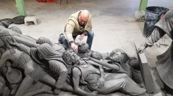 Timothy P. Schmalz with his sculpture ‘Let the Oppressed Go Free.’. Courtesy of Timothy P. Schmalz.