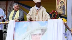 Cardinal Antoine Kambanda of Rwanda unveiling the image of Blessed Maria Carola during the beatification ceremony held at Kinoru stadium in Kenya's Meru Diocese. Credit: ACI Africa.