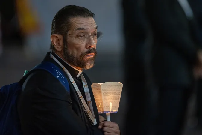 Bishop Daniel Flores of Browsville, Texas, a delegate at the Synod on Synodality, participates in an ecumenical prayer service in Protomartyrs Square at the Vatican on Oct. 11, 2024.