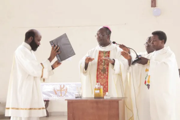 Bishop Emmanuel Fianu, SVD of Ho Diocese in the Volta Region blessing the Oils at the Diocesan Chrism Mass on April 8, 2020 attended by only the Deans of the Diocese. / Diocesan Communications Office