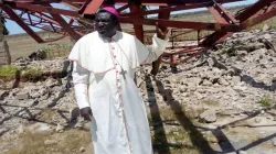 Bishop Hilary Nanman Dachelem of Bauchi, Nigeria, surveys damage inflicted on a parish church by Boko Haram and Fulani herdsmen. Credit: Aid to the Church in Need