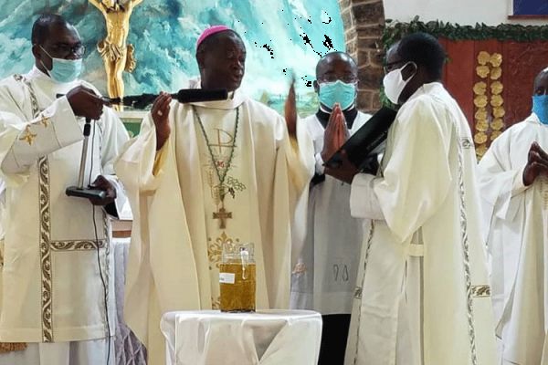 Bishop George Nkuo of the Catholic Diocese of Kumbo in Cameroon blessing the oils at the Chrism Mass Thursday, May 28, 2020. / Deacon Leonard Nyuydze