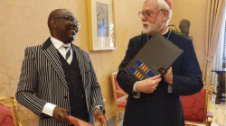 Archbishop Paul Richard Gallagher (right), Vatican's Secretary for Relations with States and Mr. Robert Compaore (left), Ambassador of Burkina Faso to the Holy See during the exchange of the Instruments of Ratification of the Agreement between the Holy See and the State of Burkina Faso on the legal status of the Catholic Church in Burkina Faso. / Holy See Press Office