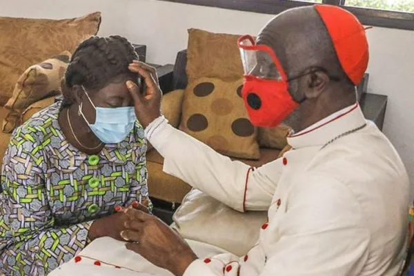 Jean Pierre Cardinal Kutwa granting his blessings to Mariatou Koné who was recently appointed Minister for Education and Literacy in Ivory Coast. Credit: Courtesy Photo