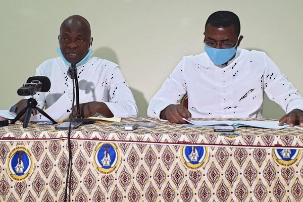 Fr. Emmanuel Wohi Nin (left) Secretary-General of the Episcopal Conference of Ivory Coast (CECCI) presenting the Pastoral Letter of the Bishops on Reconciliation, Justice, and Peace, at a press conference Tuesday, July 21.