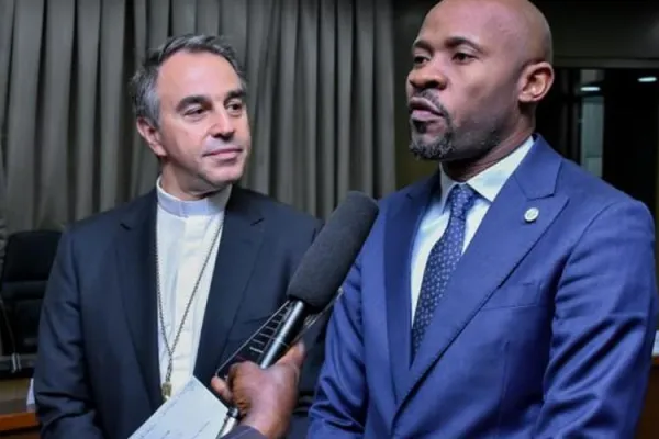 Archbishop Ettore Balestrero (left) and Minister Patrick Muyaya (right) addressing journalists after the first preparatory meeting ahead of the Pope's July 2-5 trip to DRC. Credit: Primature RDC/Facebook