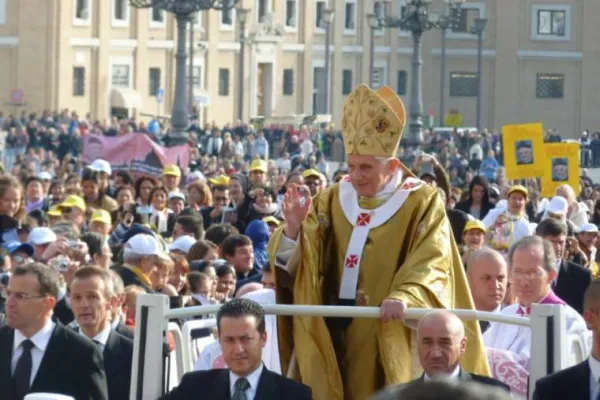 Paolo Gabriele sits in front of Pope Benedict XVI in the popemobile in St. Peter's Square Oct. 24, 2011. / Alan Holdren/CNA.