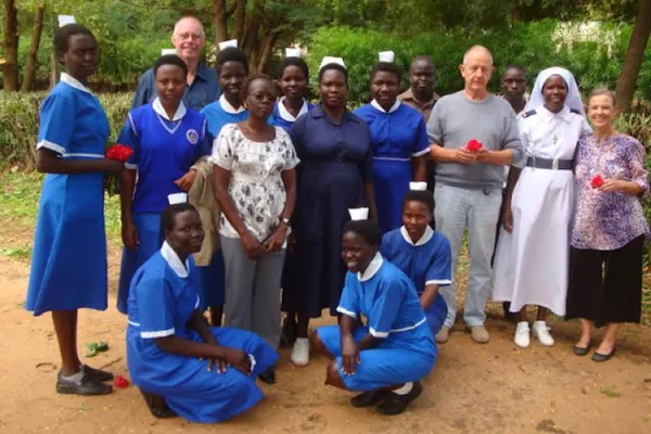 Dr. Erik  Domini (on the front row) poses for a photo with staff and midwifery students at Kalongo hospital in Northern Uganda. Erick is the doctor who asked to pray seeking the intercession of Fr. Ambrosoli for a woman who was in a comma. Credit: Fr. Egidio Tocalli/ Comboni Missionaries