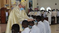 Archbishop Hubertus van Megen laying hands on the candidates for ordination during Mass at the St. John the Evangelist Parish, Karen of the Archdiocese of Nairobi. / ACI Africa