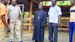 Bishop Robert Kasaija Muhiirwa Akiiki during the official handing over of a zero grazing dairy unit to the Diocese of Fort Portal Catholic Diocese. Credit: Jubilee Radio