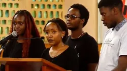 Members of the Youth Serving Christ (YSC) of Holy Family Minor Basilica of Kenya’s  Catholic Archdiocese of Nairobi (ADN) reading their message on Sunday 23 June 2024. Credit: Capuchin TV