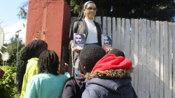 Children gather around the statue of Sr. Anna Ali of the Most Holy Eucharist at the Eucharistic Center in the Catholic Diocese of Eldoret. Credit: ACI Africa