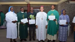 The team of six Nigerians sent to the United States by CBCN in a group photograph with the CBCN president Archbishop Lucius Ugorji. Credit: ACI Africa