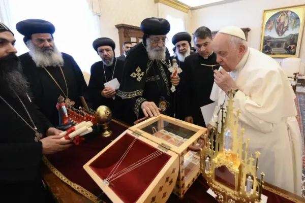 Pope Francis receives relics of the Coptic martyrs from Pope Tawadros II, the head of the Coptic Orthodox Church of Alexandria, May 11, 2023. Pope Francis also announced that the 21 men will be added to the Church’s official list of saints. | Credit: Vatican Media