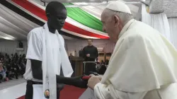 Pope Francis meets a boy living in an IDP camp during a gathering in Juba, South Sudan, on Feb. 4, 2023. | Vatican Media