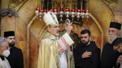 Patriarch Pierbattista Pizzaballa blesses the congregation at the Church of the Holy Sepulchre in Jerusalem on April 4, 2021. | Latin Patriarchate of Jerusalem.