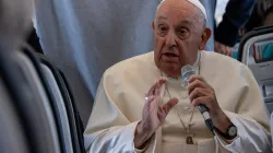 Pope Francis speaks aboard the papal plane on Sunday, Sept. 29, 2024. / Credit: Daniel Ibáñez/CNA